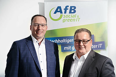 Jürgen Münzner und Andreas Schmidt vom AfB Team Oberösterreich freuen sich auf ein Kennenlernen beim AfB Pop-Up-Store Opening in Linz © AfB